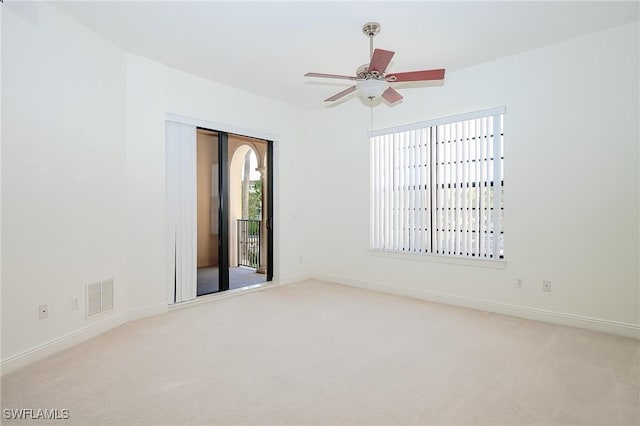 23159 Amgci Way Unit 3108, Estero, FL 33928 - empty room featuring carpet floors, a ceiling fan, and baseboards
