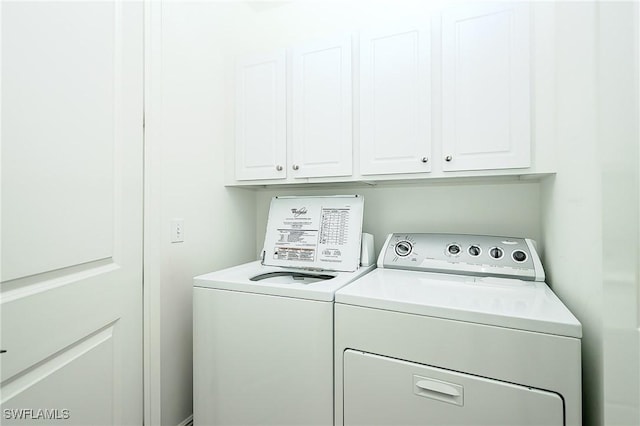 23159 Amgci Way Unit 3108, Estero, FL 33928 - laundry room with independent washer and dryer and cabinet space