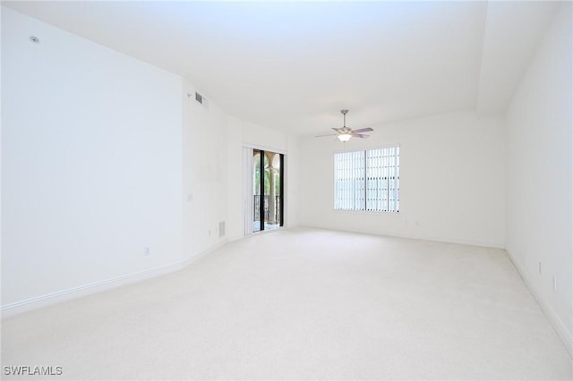23159 Amgci Way Unit 3108, Estero, FL 33928 - empty room with light colored carpet, ceiling fan, and baseboards