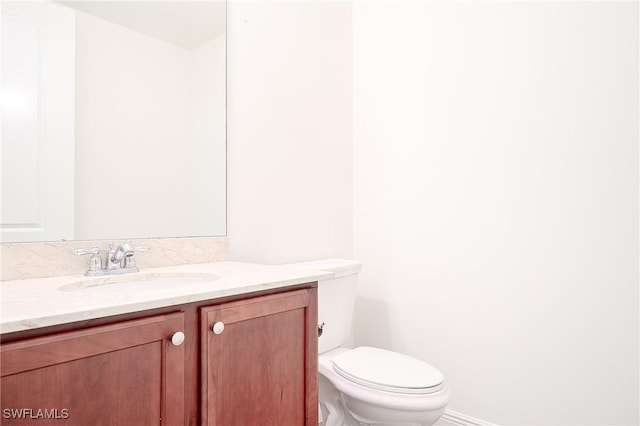 23159 Amgci Way Unit 3108, Estero, FL 33928 - half bathroom featuring vanity and toilet