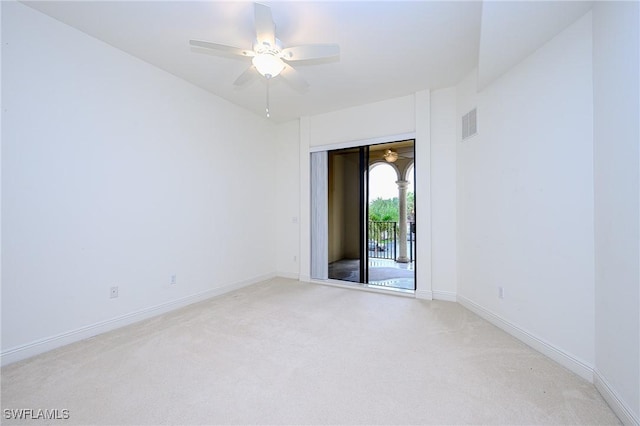 23159 Amgci Way Unit 3108, Estero, FL 33928 - empty room with light carpet, ceiling fan, and baseboards