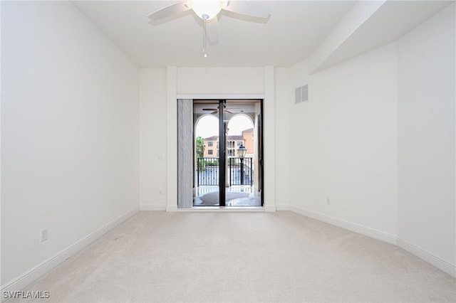 23159 Amgci Way Unit 3108, Estero, FL 33928 - empty room featuring ceiling fan, light carpet, and baseboards