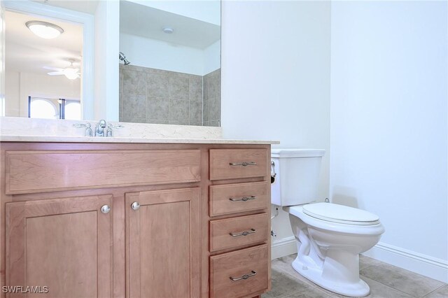 23159 Amgci Way Unit 3108, Estero, FL 33928 - full bath with toilet, vanity, baseboards, tile patterned flooring, and a shower