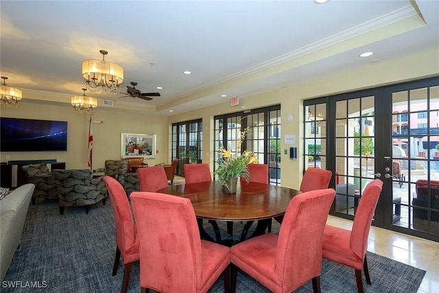 23159 Amgci Way Unit 3108, Estero, FL 33928 - tiled dining room featuring a tray ceiling, a chandelier, recessed lighting, ornamental molding, and ceiling fan