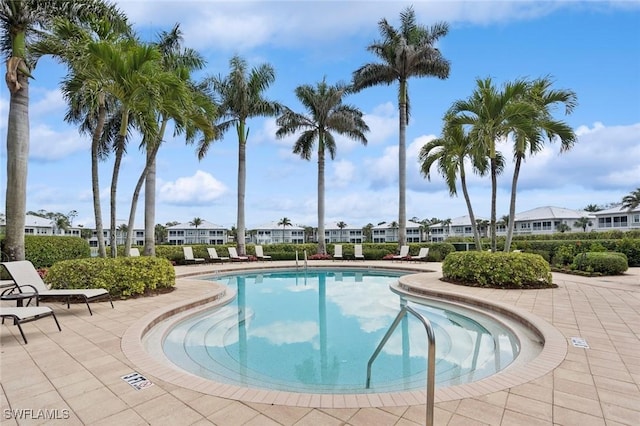 view of pool featuring a residential view