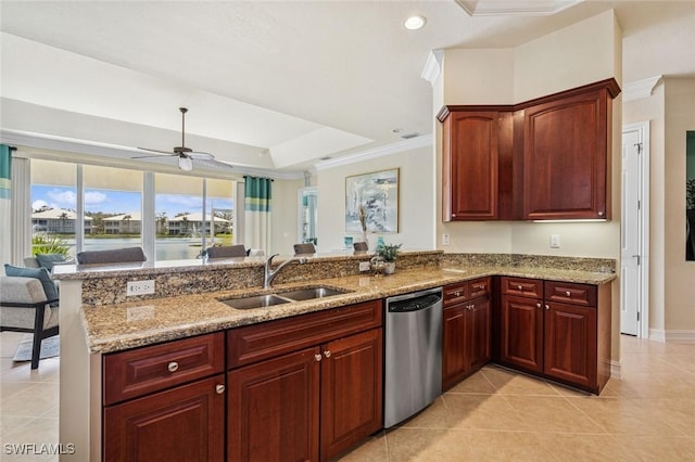 kitchen with a sink, light stone countertops, and stainless steel dishwasher