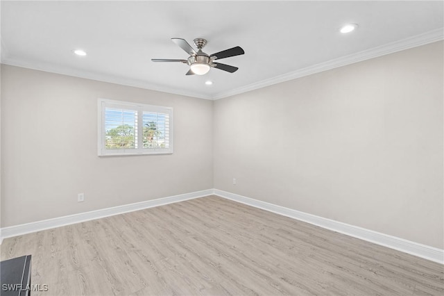 empty room with recessed lighting, wood finished floors, a ceiling fan, baseboards, and crown molding