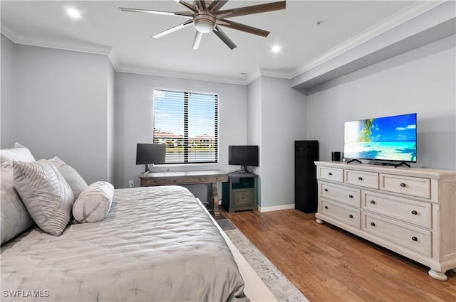 bedroom featuring light wood-style floors, recessed lighting, crown molding, and baseboards