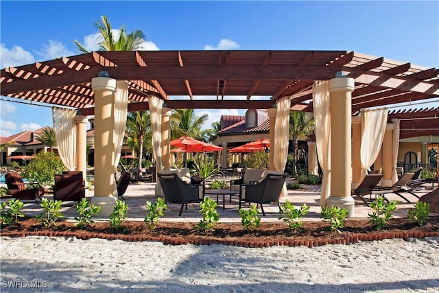 view of patio featuring a pergola