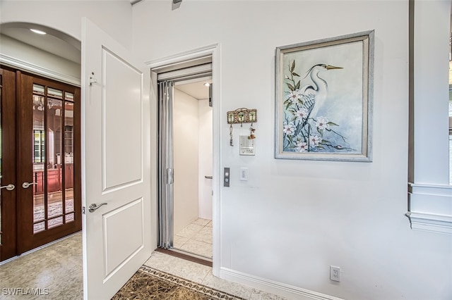 hallway featuring french doors