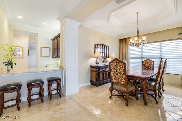 dining area with decorative columns, baseboards, crown molding, a chandelier, and recessed lighting