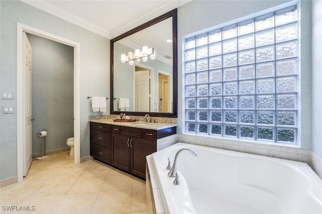 full bath featuring tile patterned flooring, toilet, vanity, a bath, and crown molding