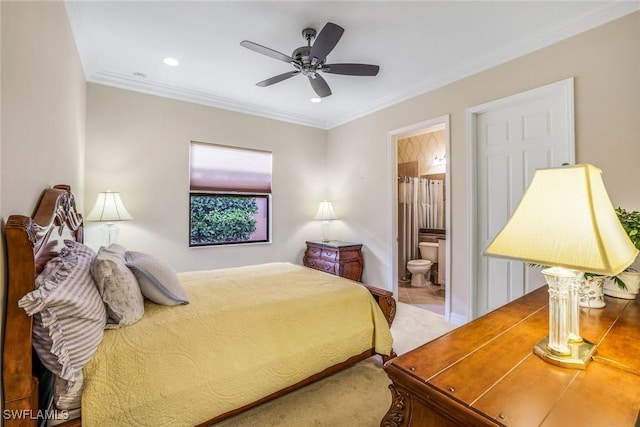 carpeted bedroom featuring recessed lighting, ceiling fan, crown molding, and ensuite bathroom