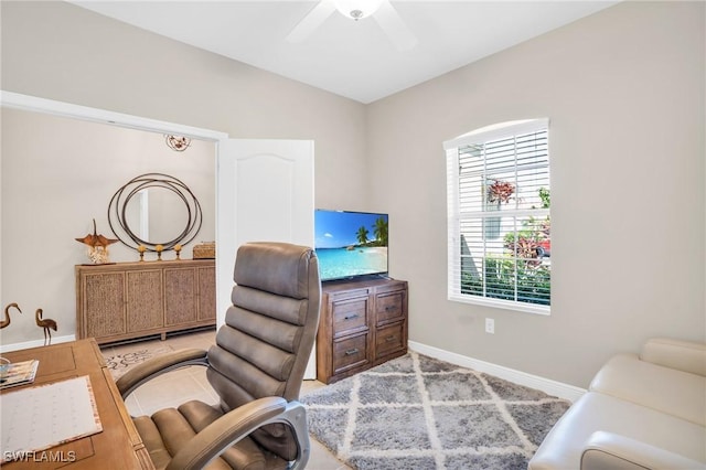 office with baseboards and ceiling fan