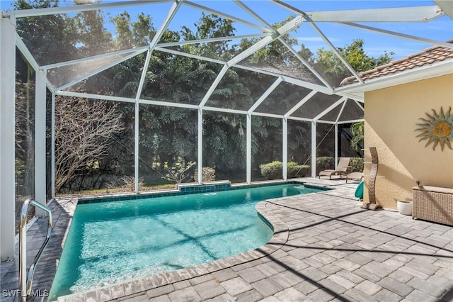 outdoor pool featuring a patio area