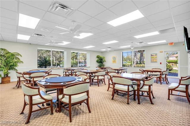 dining room with visible vents, a paneled ceiling, and a ceiling fan