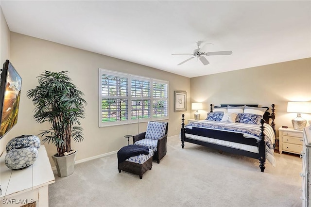 bedroom featuring ceiling fan, carpet floors, and baseboards