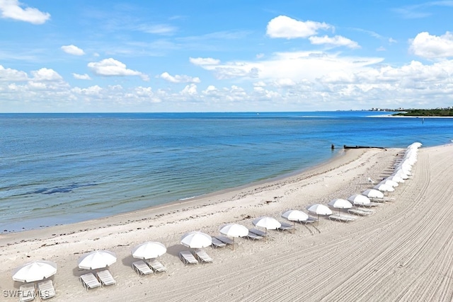 view of water feature with a beach view