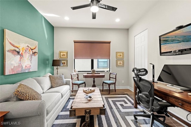 office area featuring baseboards, wood finished floors, a ceiling fan, and recessed lighting