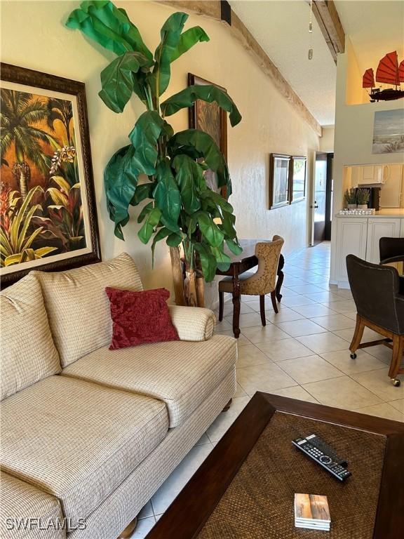 living room featuring light tile patterned floors