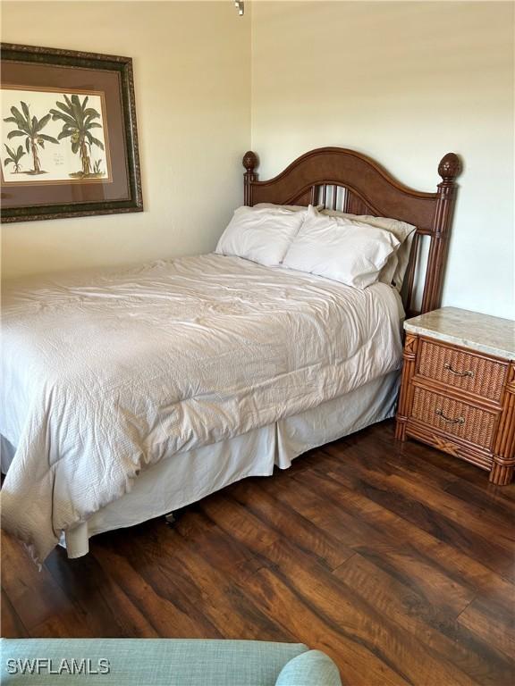 bedroom featuring wood finished floors