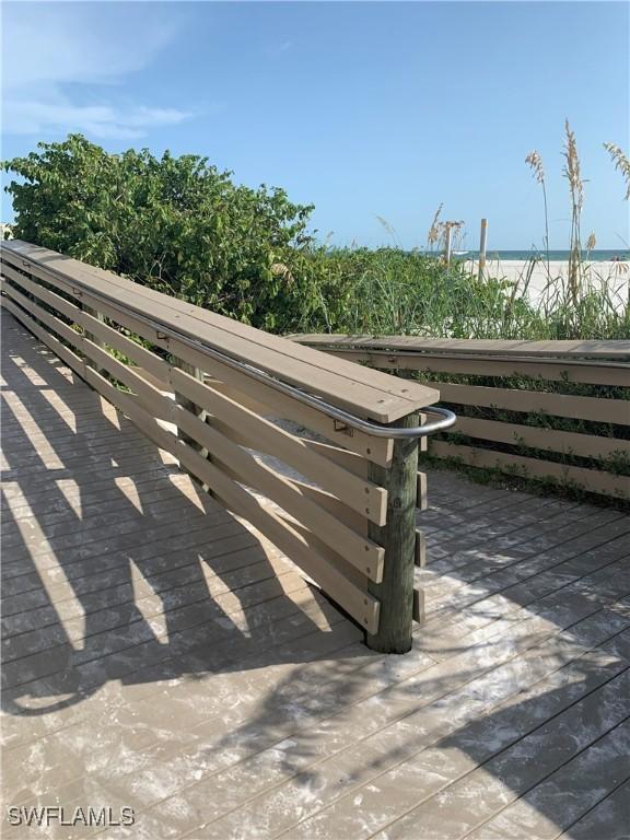 exterior details featuring a view of the beach