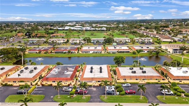 aerial view with a residential view and a water view