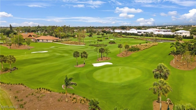 view of home's community featuring golf course view