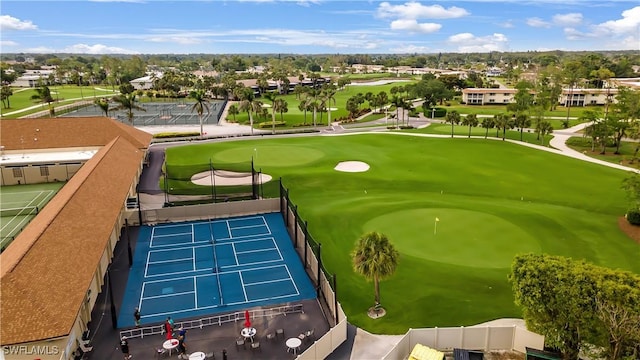 birds eye view of property featuring view of golf course