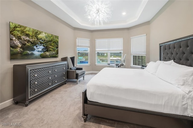 bedroom with crown molding, carpet flooring, a raised ceiling, and baseboards