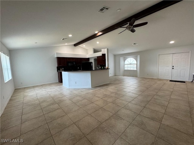 unfurnished living room with light tile patterned floors, visible vents, lofted ceiling with beams, ceiling fan, and baseboards