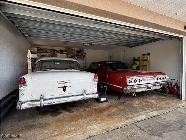 garage featuring a garage door opener