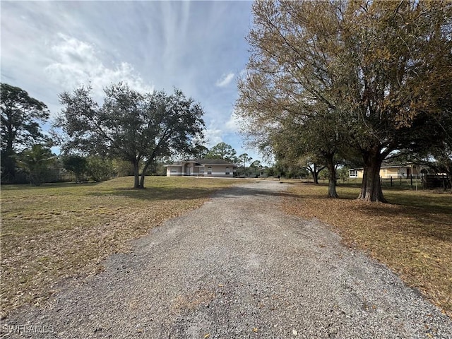 view of road featuring driveway