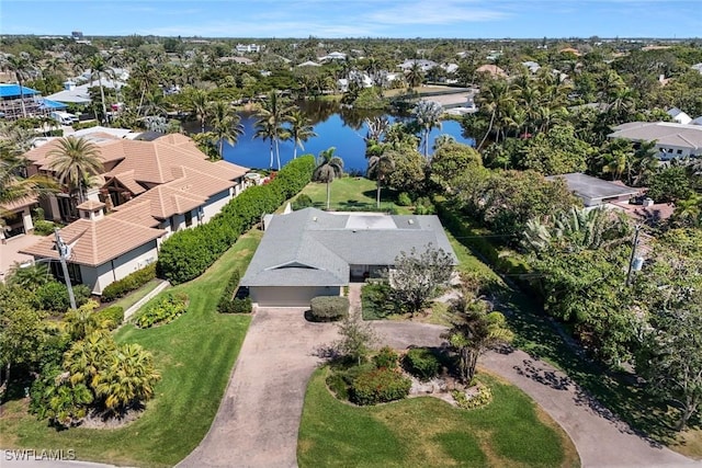 birds eye view of property featuring a water view and a residential view