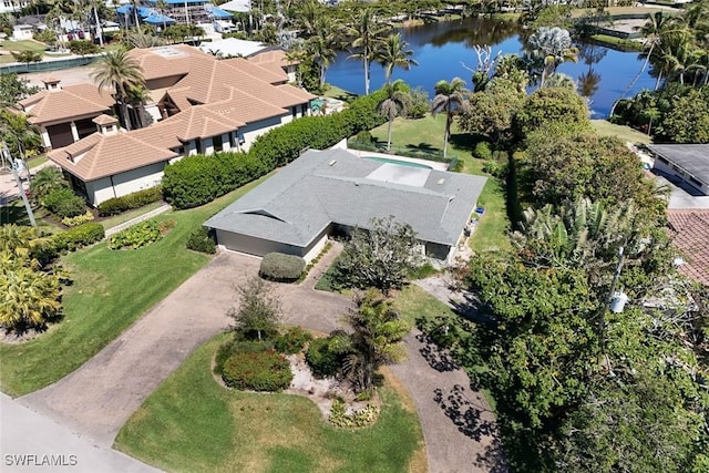 bird's eye view featuring a water view and a residential view