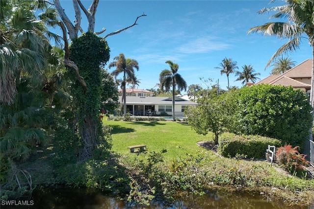 view of yard with a water view