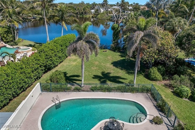 view of pool with a fenced in pool, fence, and a water view