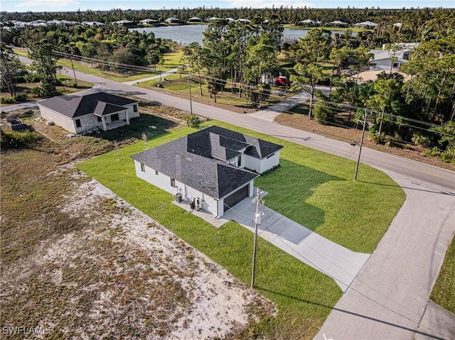 drone / aerial view with a water view