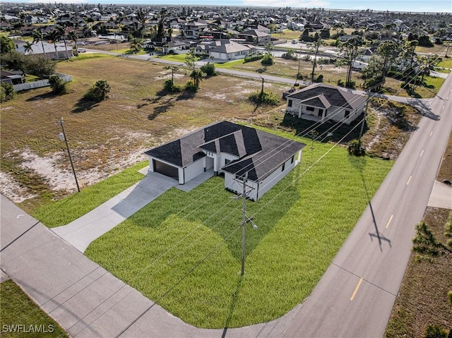 drone / aerial view featuring a residential view