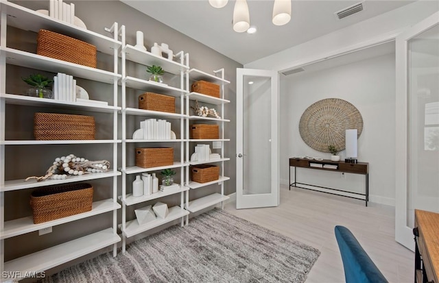 interior space featuring visible vents and french doors