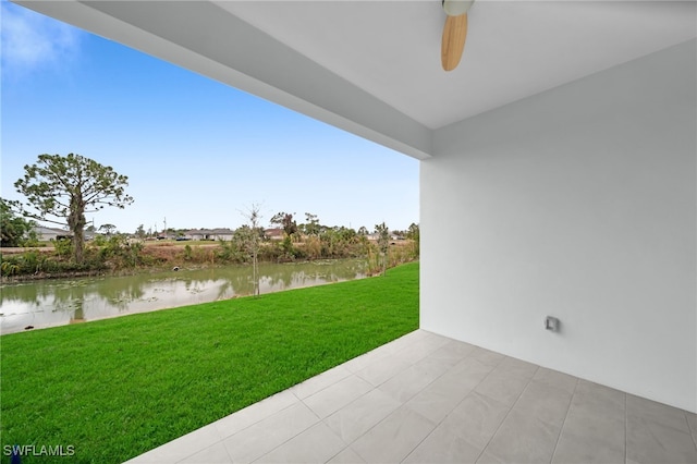 view of patio / terrace with a water view