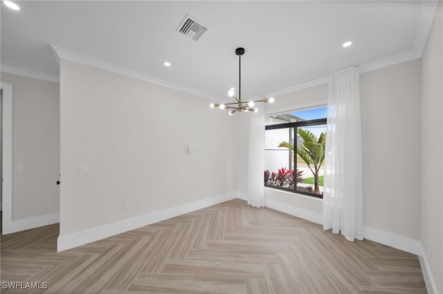 empty room with visible vents, crown molding, baseboards, and an inviting chandelier