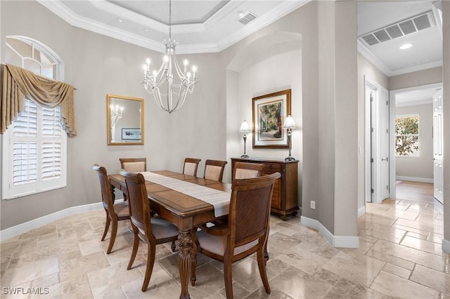 dining room with baseboards, crown molding, visible vents, and stone tile floors