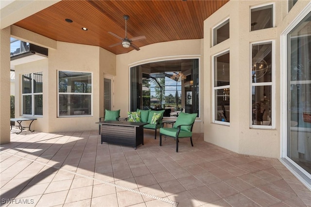 view of patio with ceiling fan and an outdoor hangout area