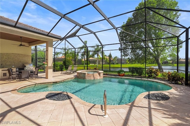 view of swimming pool featuring glass enclosure, a pool with connected hot tub, ceiling fan, and a patio