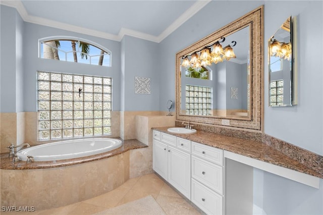 full bath featuring a bath, tile patterned floors, vanity, and crown molding