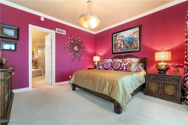 carpeted bedroom with ornamental molding, visible vents, connected bathroom, and baseboards