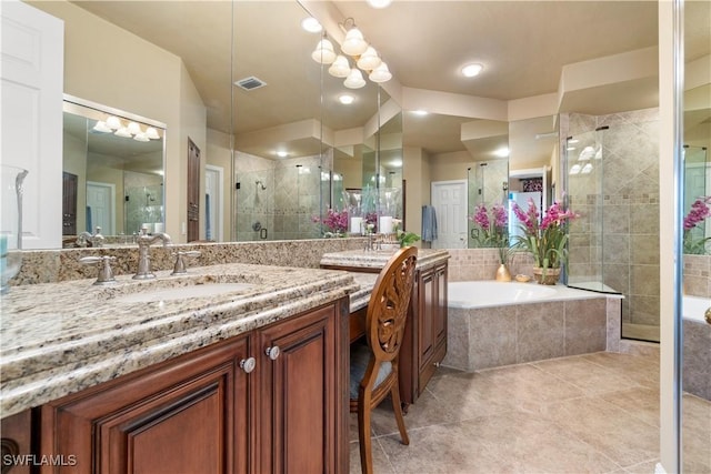 bathroom featuring visible vents, a shower stall, vanity, tile patterned flooring, and a bath