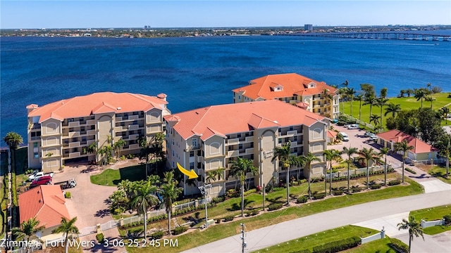 drone / aerial view with a water view