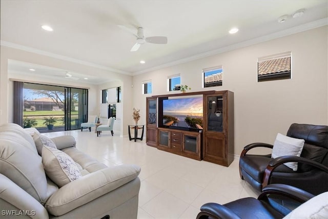 living room featuring recessed lighting, a ceiling fan, baseboards, and ornamental molding